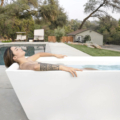 Plunge woman by pool