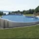 Smart Design Ideas for Semi-Inground Pools in Small or Sloped Backyards