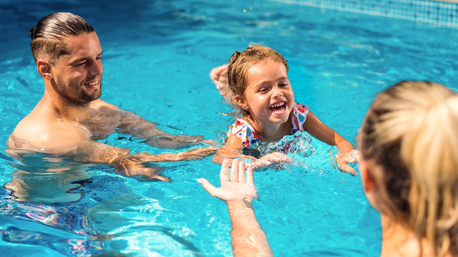 family in the pool